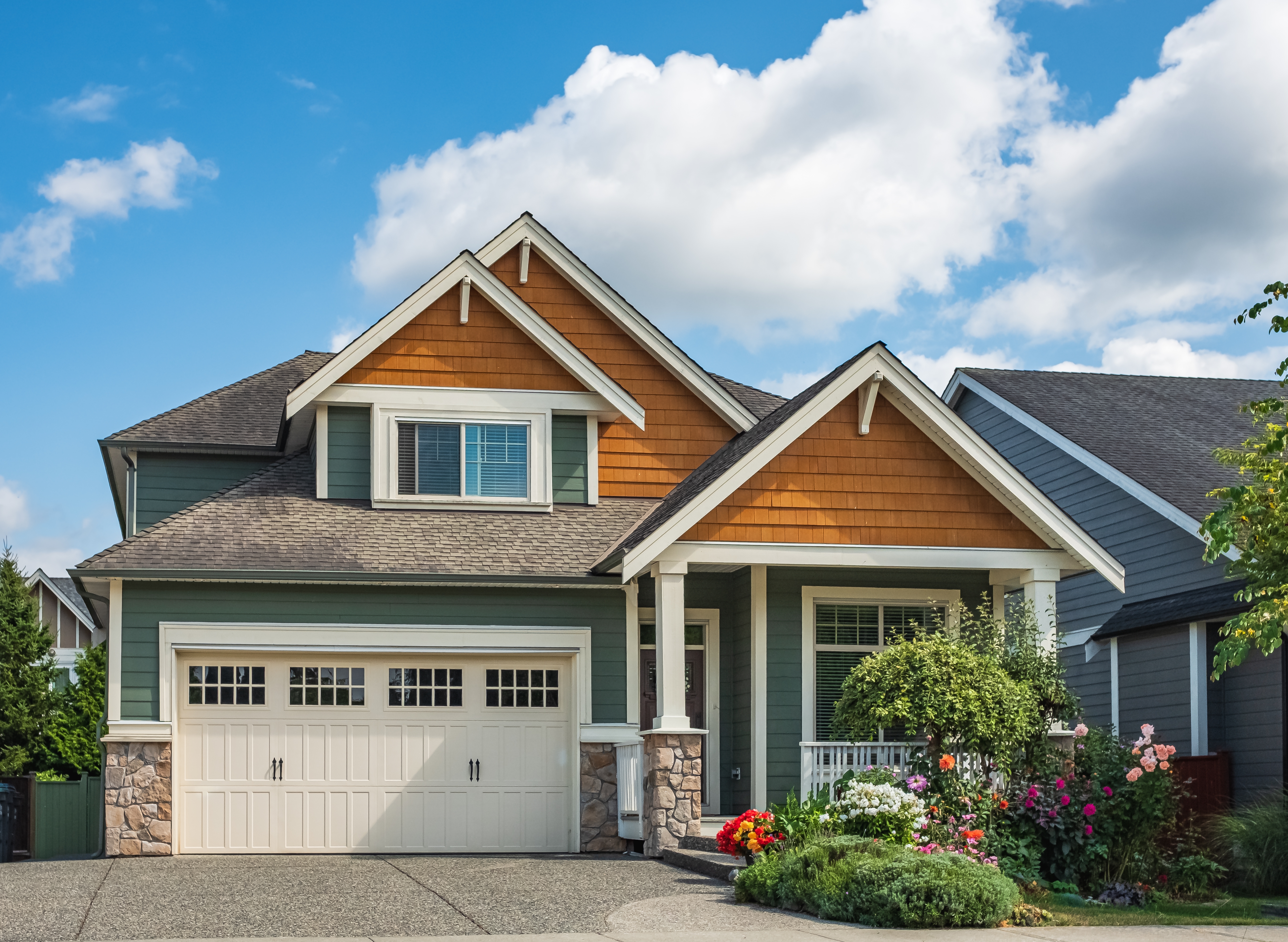 Home with an aging asphalt-shingle roof that's a candidate for rejuvenation